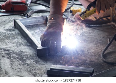 A Welder Is Assembling The Iron Work.