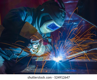 welder, craftsman, erecting technical steel Industrial steel welder in factory