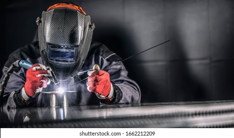 Welder Industrial Worker Welding With Argon Machine.