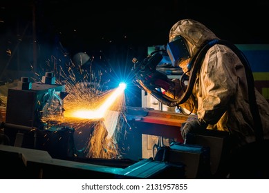 Welder repair gear overhaul housing bore by Wire Arc Spraying stainless steel coating process in factory workshop. - Powered by Shutterstock