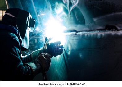 Welder Worker Doing Aluminum Welding