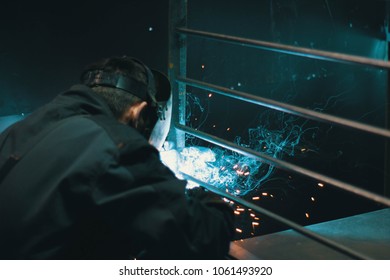 Welder working a welding metal -Welders and Flamecutters - Shutterstock ID 1061493920