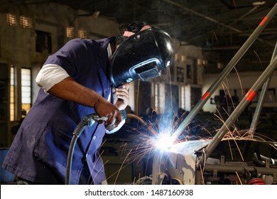 Welder-A welder who does spot welding or Indian welder guy