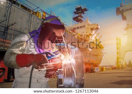 Welding arc worker with spark weld factory at shipbuilding and ship Repairing industrial, wear equipment protective for safety