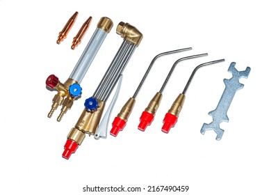 Welding brazing and cutting torch kit. A new set of welding torches for soldering and cutting metal, on a white background.