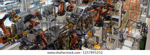 welding of car body. Automotive production line.\
long format. Wide frame