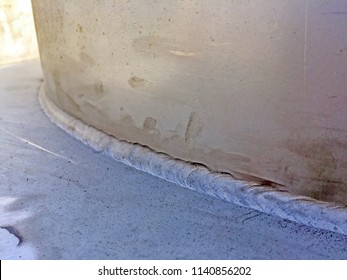 Welding defect ( undercut ) of the fillet weld. Undercutting is when the weld reduces the cross-sectional thickness of the base metal and which reduces the strength of the weld and workpieces. - Shutterstock ID 1140856202