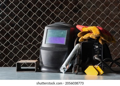 Welding Equipment On The Metal Workbench Background Close Up.