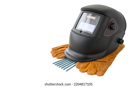 Welding Helmet With Electrodes And Gloves, On An Isolated White Background