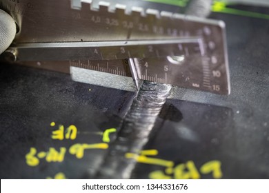 Welding inspection using welding gage measures weld and defect dimension such as reinforcement height, undercut depth. The size of discontinuities found will be compared with reference standard. - Shutterstock ID 1344331676