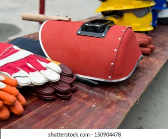 Welding Mask And Gloves On Table.