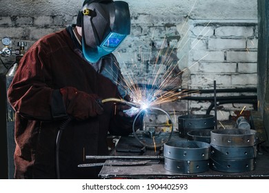 Welding metal inert gas acetylene close-up of sparks and detail in ring shape.  - Powered by Shutterstock