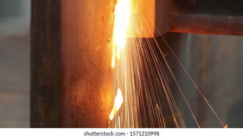 Welding Metal Iron, Sparks Falling To The Ground