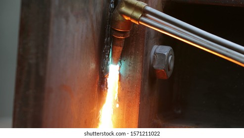 Welding Metal Iron, Sparks Falling To The Ground