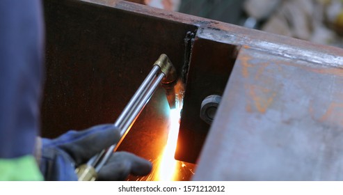 Welding Metal Iron, Sparks Falling To The Ground