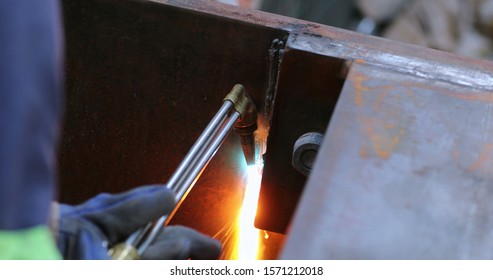 Welding Metal Iron, Sparks Falling To The Ground