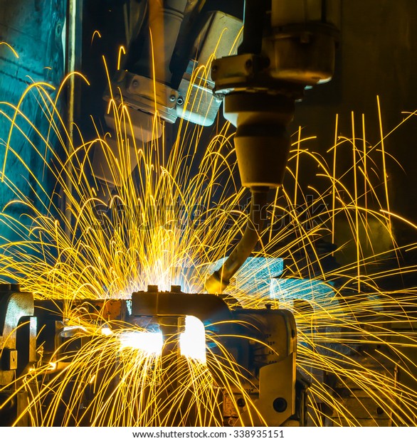 welding Robot movement Industrial automotive part\
in factory