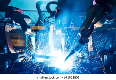 Welding Robots Movement In A Car Factory, Automotive Parts Industry