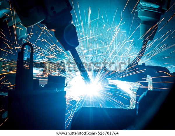Welding robots movement in a car factory,\
engineering\
manufacturing