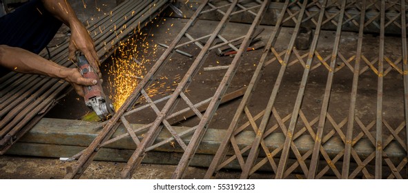 Welding A Rusty Metal Rolling Door Photo Taken In Jakarta Indonesia