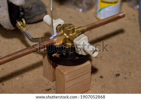 Welding soldering copper pipes on bathtub shower diverter of brass fittings