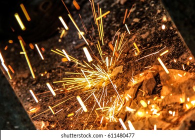 Welding Sparks Falling On The Ground. Raining Sparks.