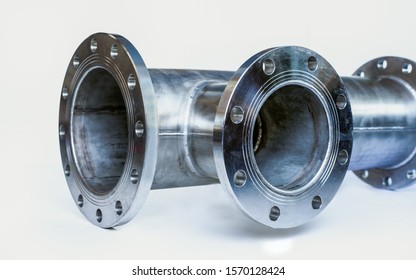 Welding Of Stainless Steel Flange On A White Background.