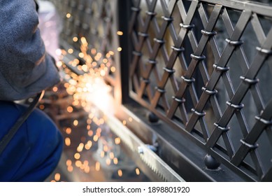 Welding The Steel Gear Racks To Gate. Last Phase Before Setting Up An Automated Gate Operator. Professional Service Of Installation And Maintenance Of Automatic Cantilever Sliding Gate.