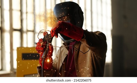 Welding Worker In Safety Mask