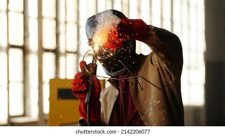 Welding Worker In Safety Mask