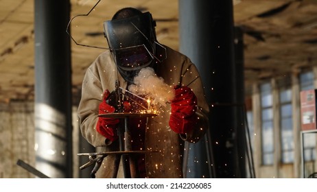 Welding Worker In Safety Mask