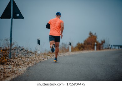 Well Built Middle Aged Athlete During A Running Exercise