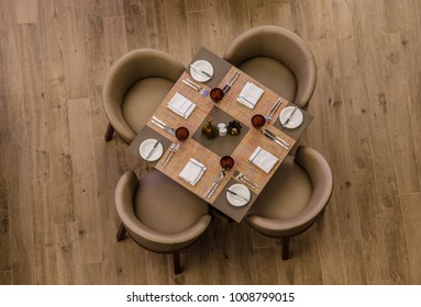 Well covered table in restaurant from above, overhead view.