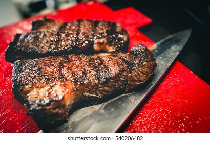 Well Done BBQ Grilled Steak Waiting To Be Sliced.