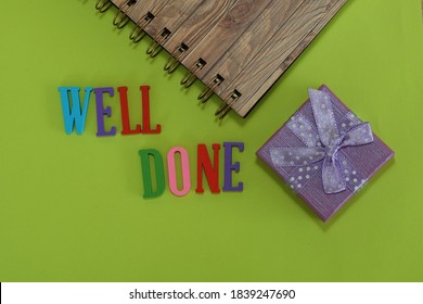 WELL DONE Word With Gift Box On Green Background