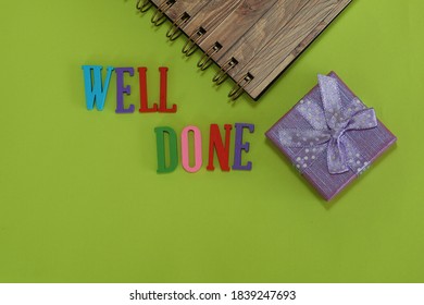 WELL DONE Word With Gift Box On Green Background