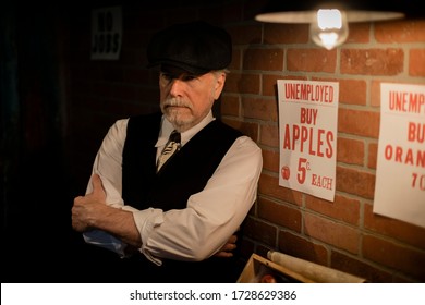 A Well Dressed Unemployed Man During The Great Depression Era Of The 1930s Peddling Apples In An Effort To Hold On To Some Self-respect And Make Some Money To Feed His Family.