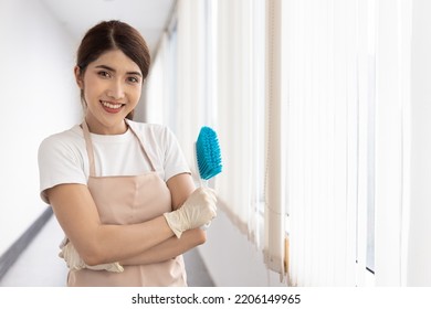 Well Equipped Immigrant Worker Woman, Confident Professional Domestic Helper Portrait With Good Working Condition