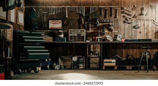 Well equipped rustic workshop featuring an assortment of tools hanging on a wooden wall, portraying a traditional craftsman environment.
 - Powered by Shutterstock