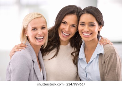 Well Get The Job Done. Cropped Portrait Of Three Businesswomen Standing In The Office.