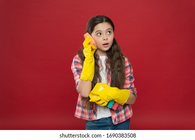 Well hello. Housekeeping duties. Turn cleaning into game. Inculcate cleanliness. Cleaning with sponge. Cleaning supplies. Girl rubber gloves hold colorful sponges. Cleaning could be fun. - Shutterstock ID 1690383508