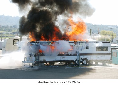 Well Involved Fire In A Travel Trailer Being Used As A Residence In Nebo Mobile Home Park, Roseburg OR $20,000 Damage 4 People Left Homeless Due To Space Heater Too Close To Combustibles