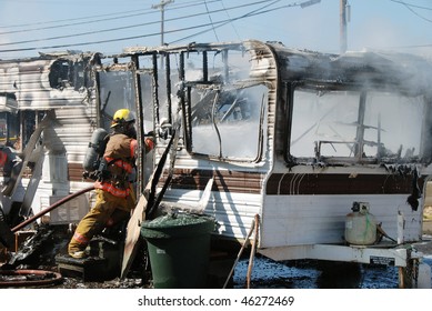 Well Involved Fire In A Travel Trailer Being Used As A Residence In Nebo Mobile Home Park, Roseburg OR $20,000 Damage 4 People Left Homeless Due To Space Heater Too Close To Combustibles