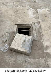 A Well Made Of Cement In The Yard Of The House