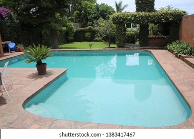 Well maintained pool in the backyard of a house in Cuernavaca, Mexico. This city is known as the City Of  Eternal Spring.