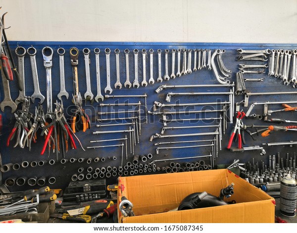 A\
well ordered workshop with different sizes of\
wrenches