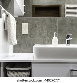 Well Organized Modern Bathroom With White Towels