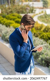 Well Suited Businessman Is Having A Second Look At His Work Plans About The Company