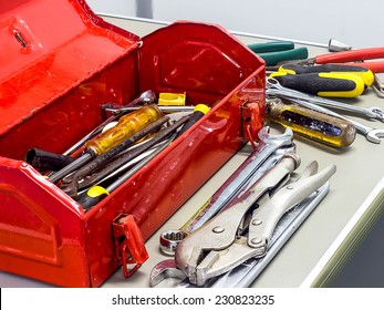 Well Used Old Tools And Red Tool Box