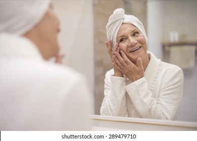 Well-groomed woman with a turban on her head  - Powered by Shutterstock